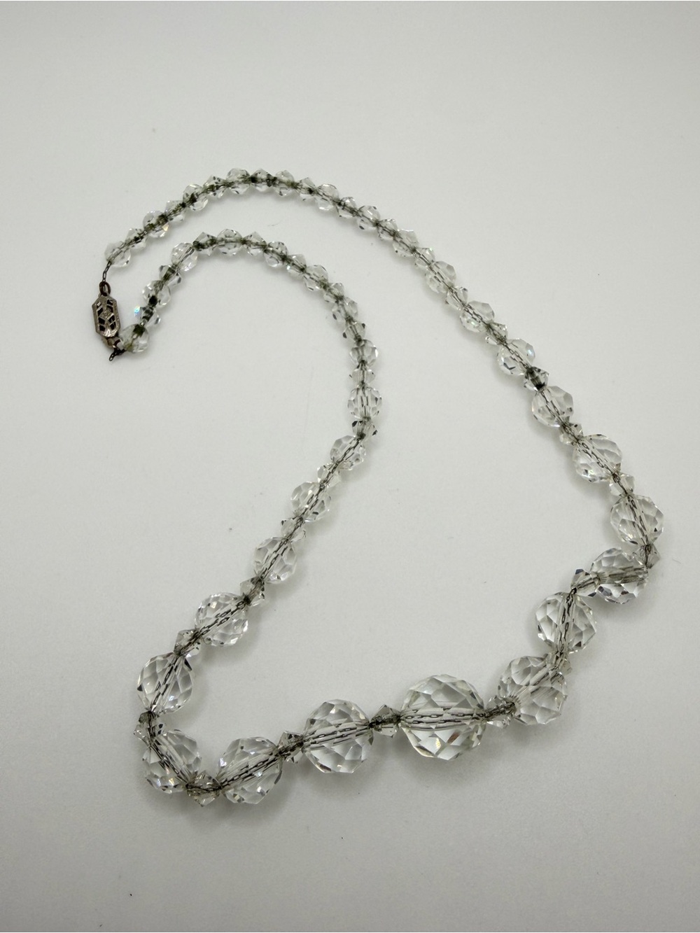 18" VTG Heavy Graduated, faceted CRYSTAL beaded necklace w/ silver tone clasp!